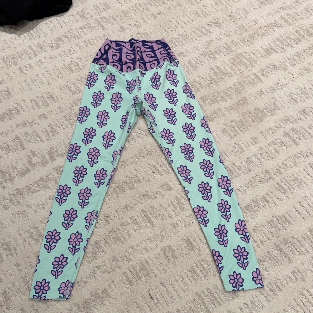 RHODE Leggings with Purple Floral Design
